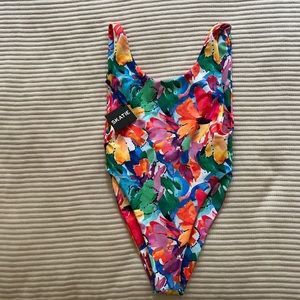 Skatie Swim one piece deep neck high rise minimal backside low scoop back